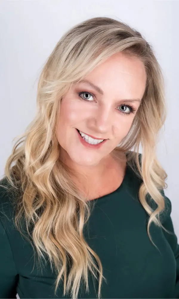 1743793702_Mysti Smiling woman with long blonde hair.